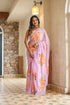 Unique party wear saree hand painted in pink with vibrant floral designs for elegant occasions