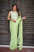 Elegant light green Stylera unique saree for wedding guest with floral design and soft fabric