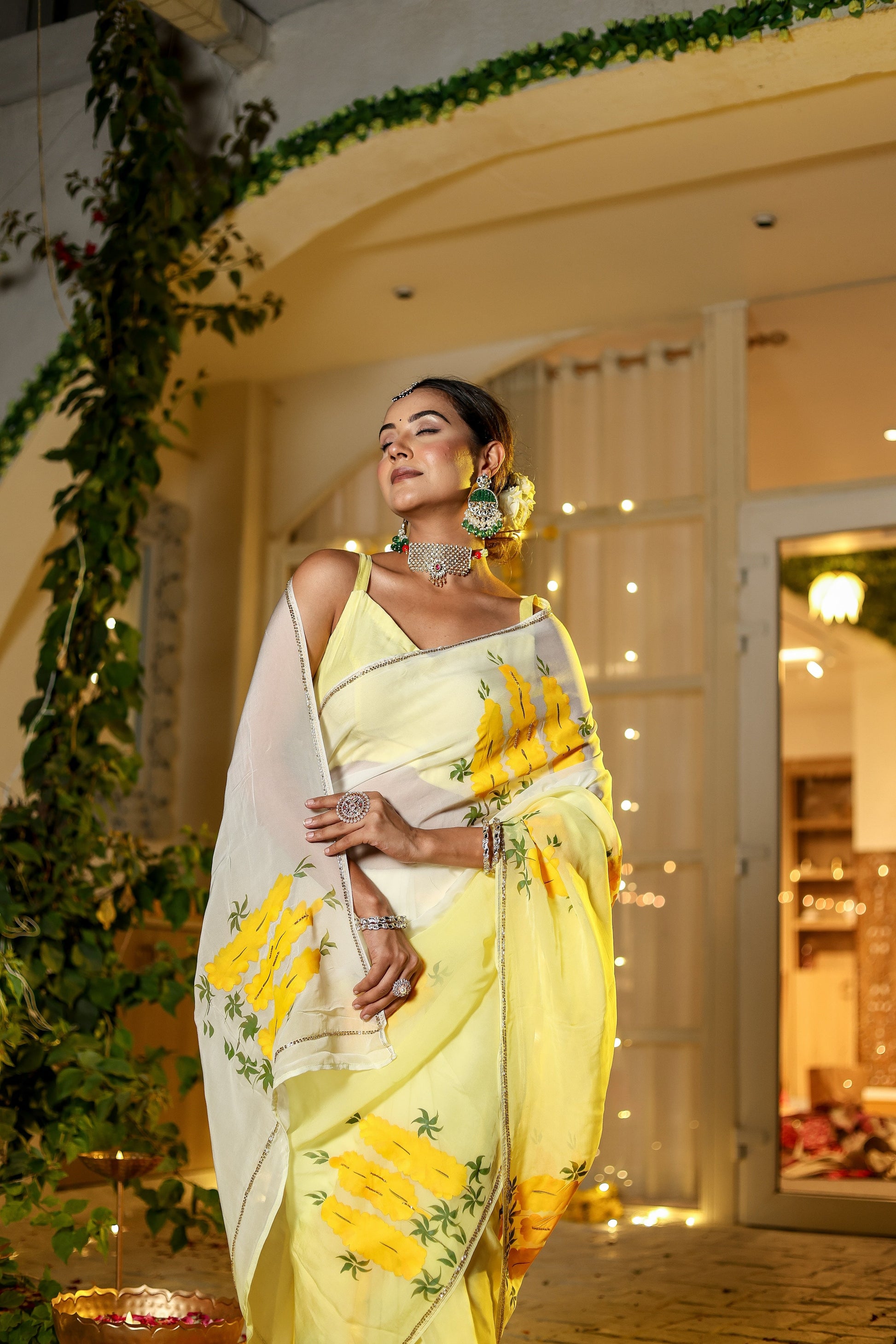 Elegant wedding organza saree yellow with floral patterns, ideal for festive occasions and celebrations