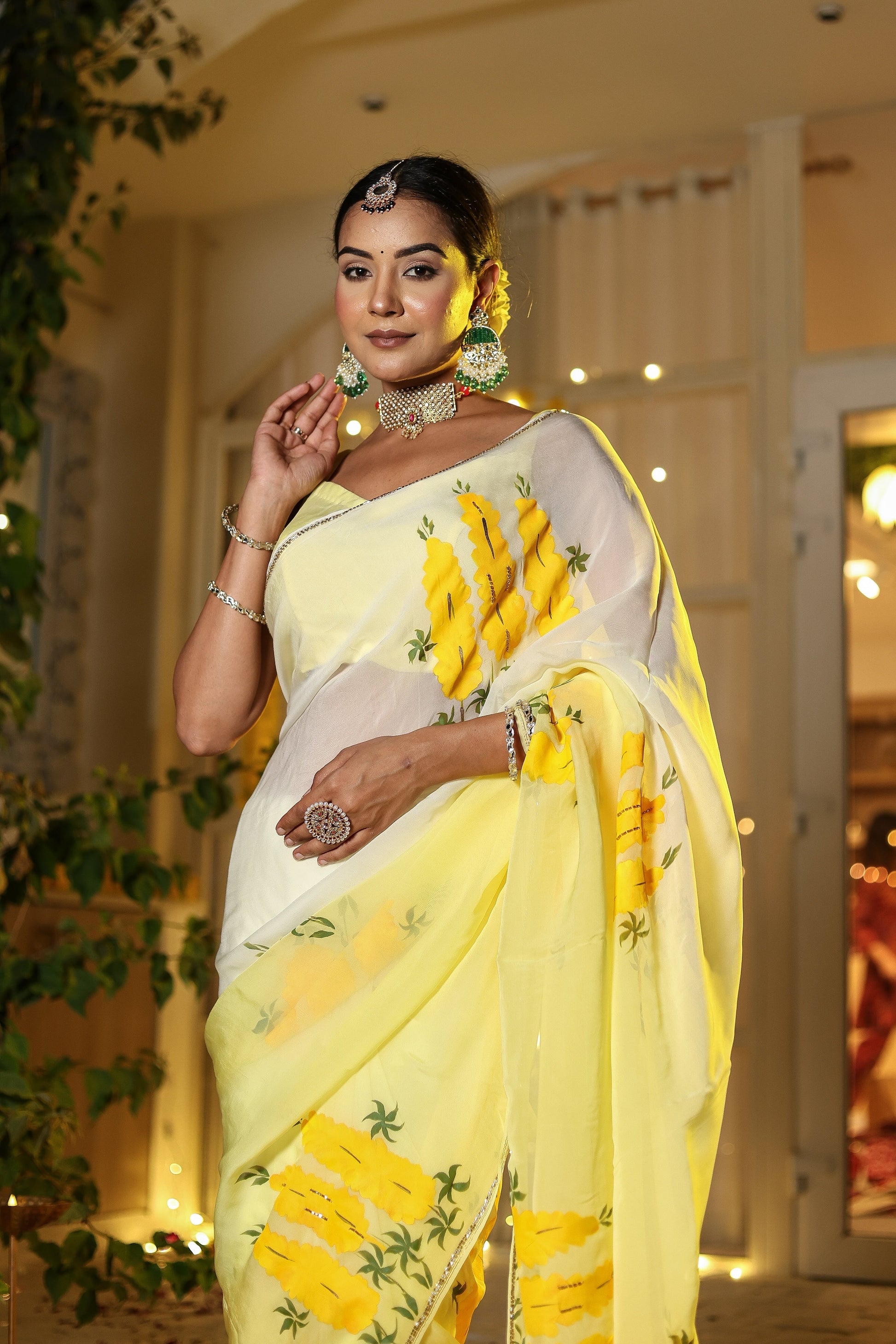 Elegant wedding organza saree yellow with floral patterns, ideal for festive occasions