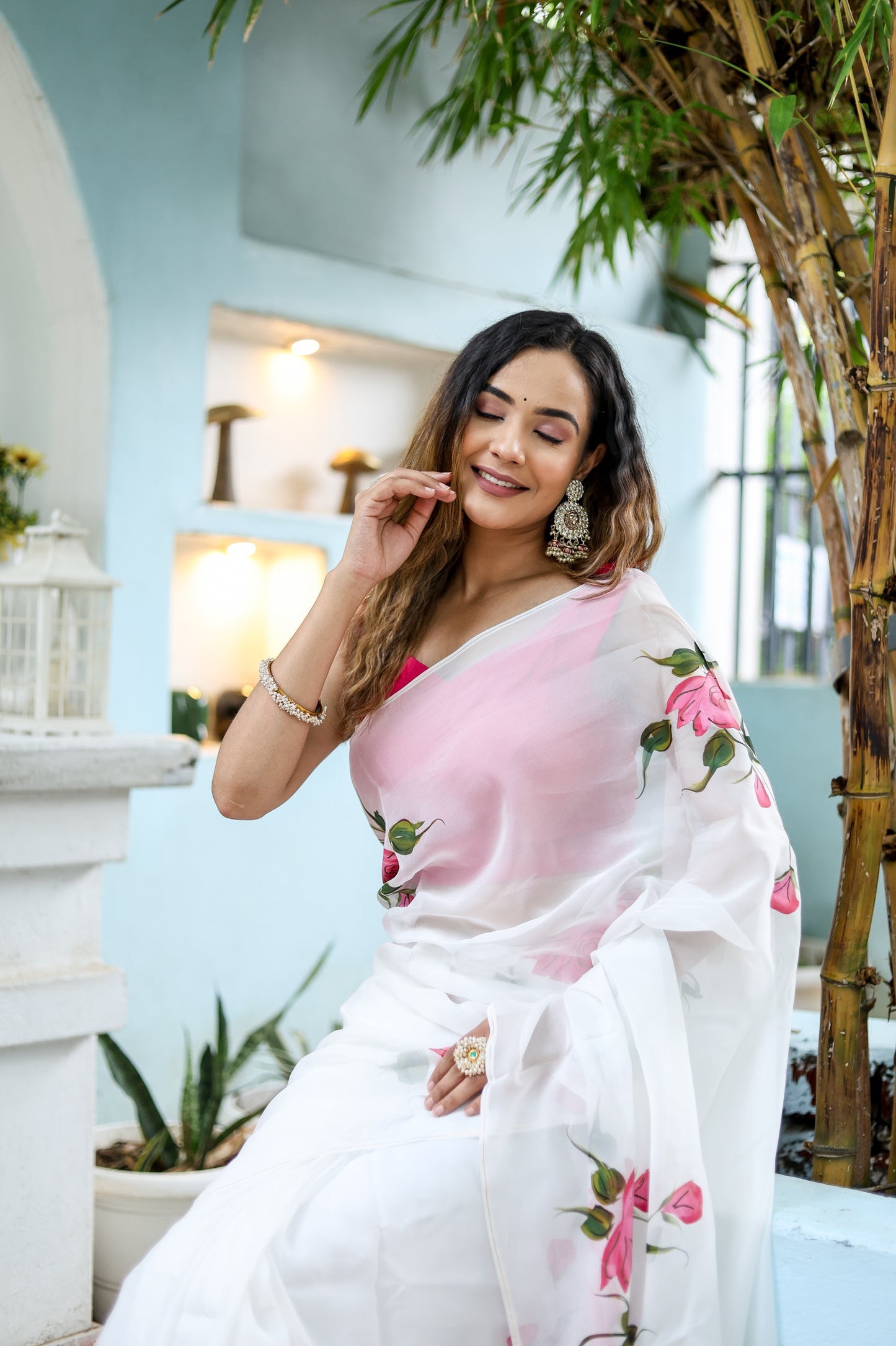 Elegant white floral saree for women with pink rose embroidery, perfect for festive occasions