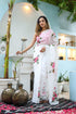 Elegant white floral saree for women featuring pink blooms, perfect for festive occasions