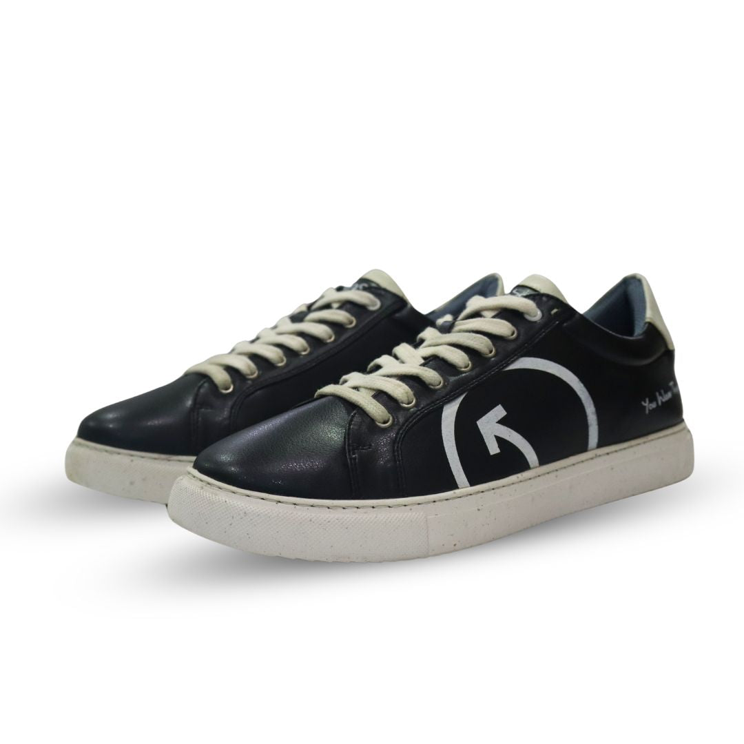 Stylish black women's casual fashion sneakers with contrasting laces and logo design