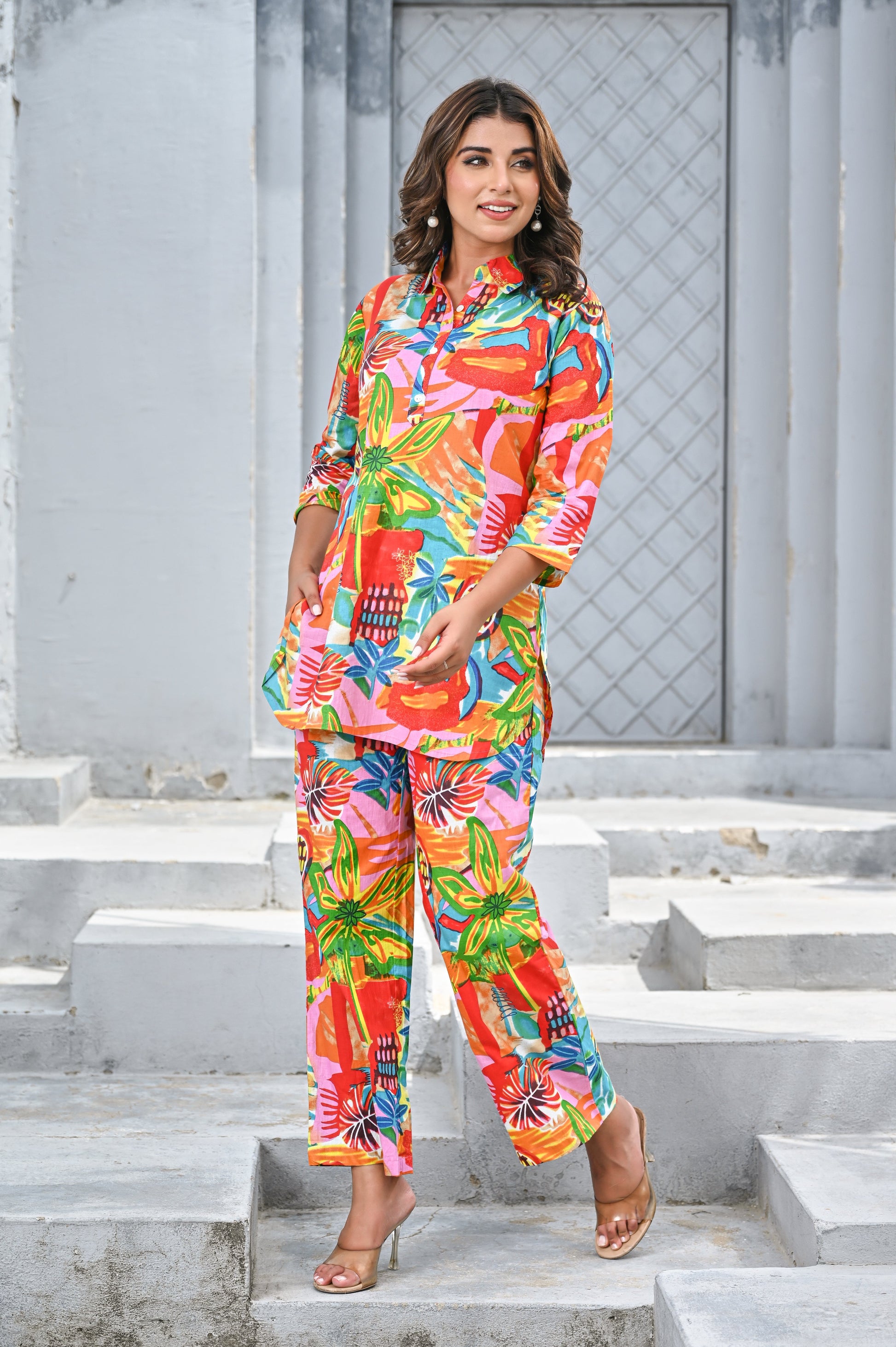 Colorful women’s tropical print co-ord set featuring vibrant floral patterns and a stylish top and pants combination