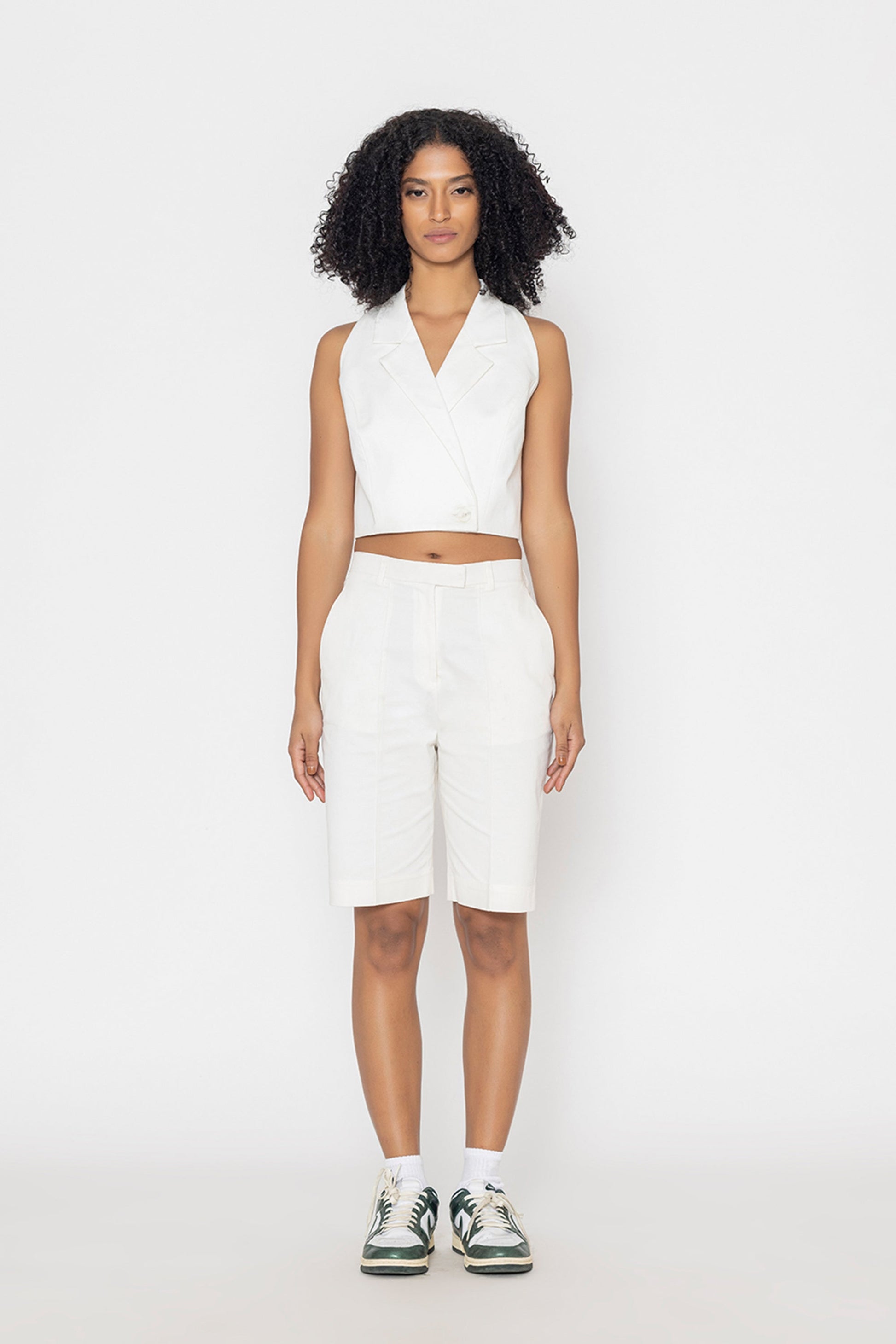 Stylera women's white vest top sleeveless cropped style paired with white shorts