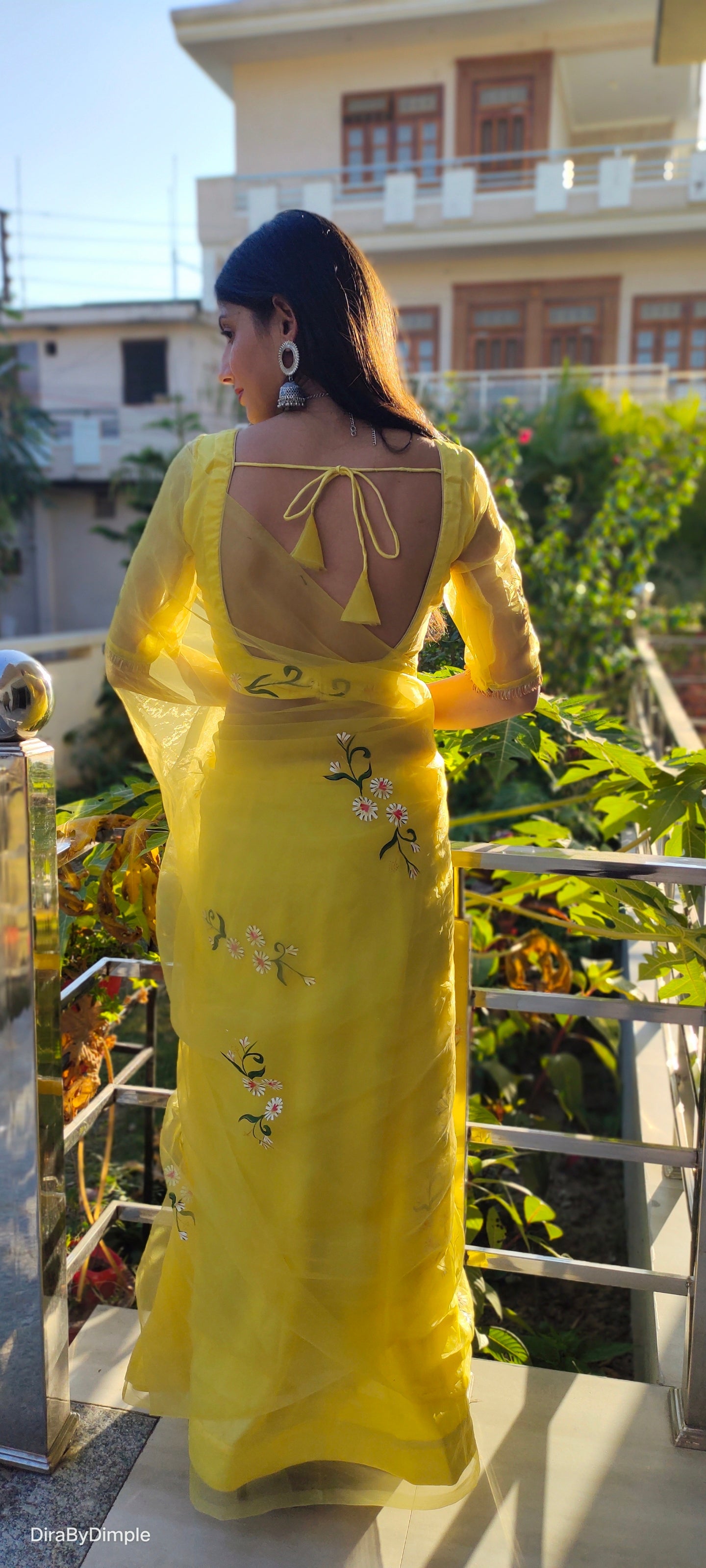 Elegant yellow sunflower saree with floral embroidery, perfect for festive occasions and traditional celebrations