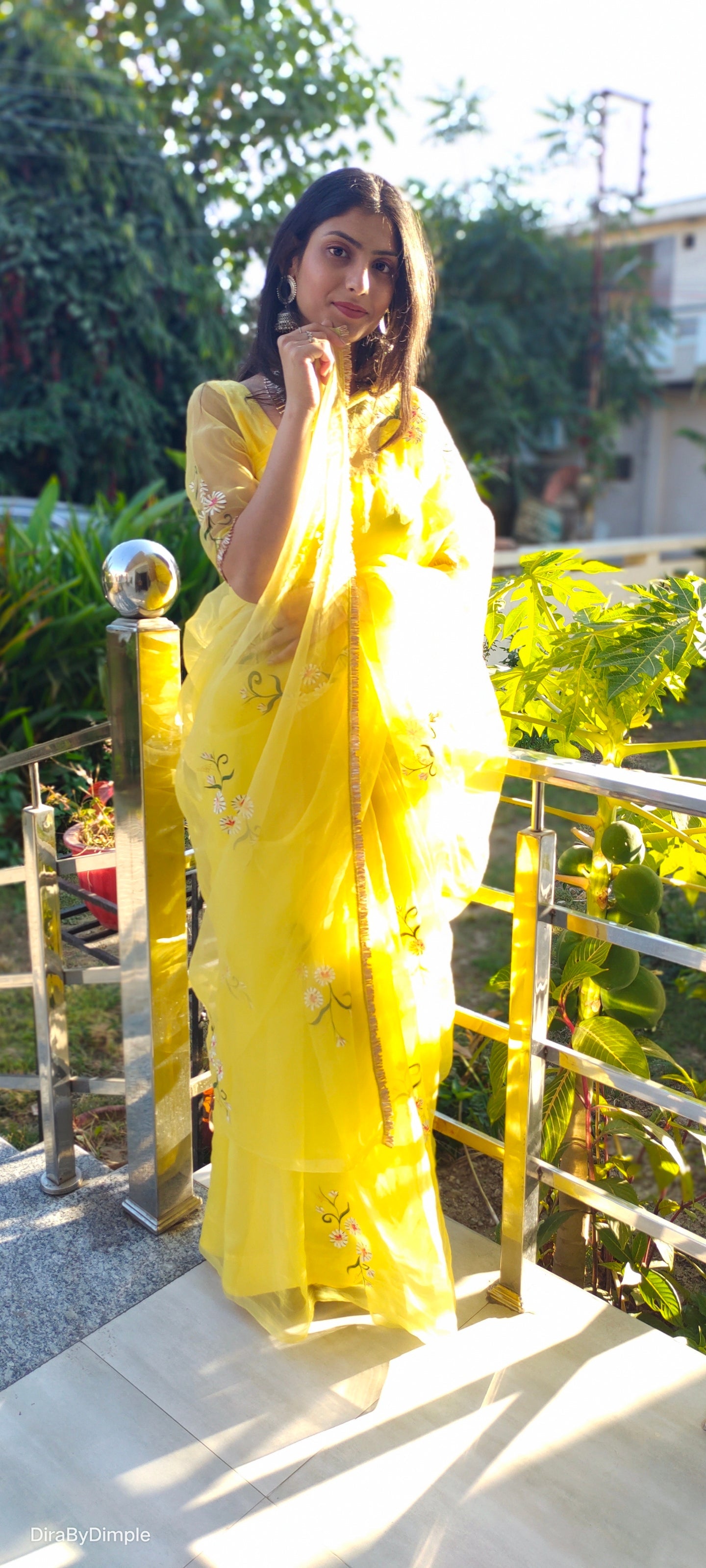 Elegant yellow sunflower saree by DiraByDimple with floral embroidery detail