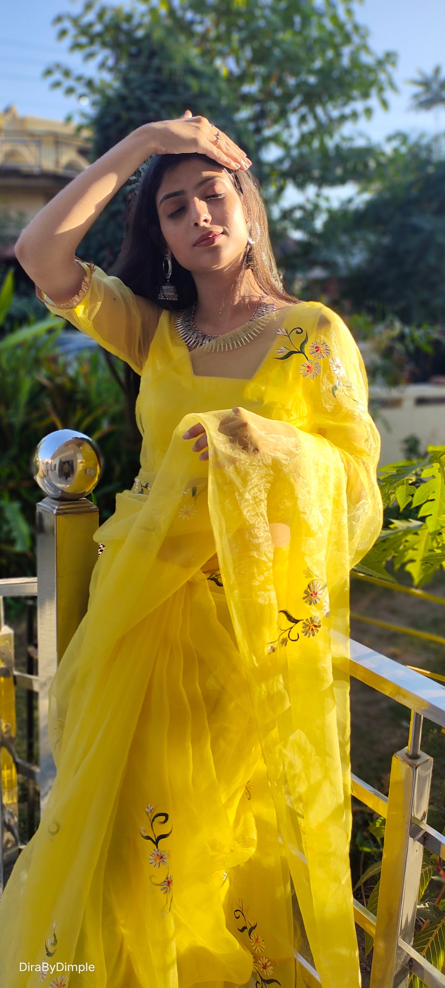 Elegant yellow sunflower saree by DiraByDimple with floral embroidery and sheer pallu