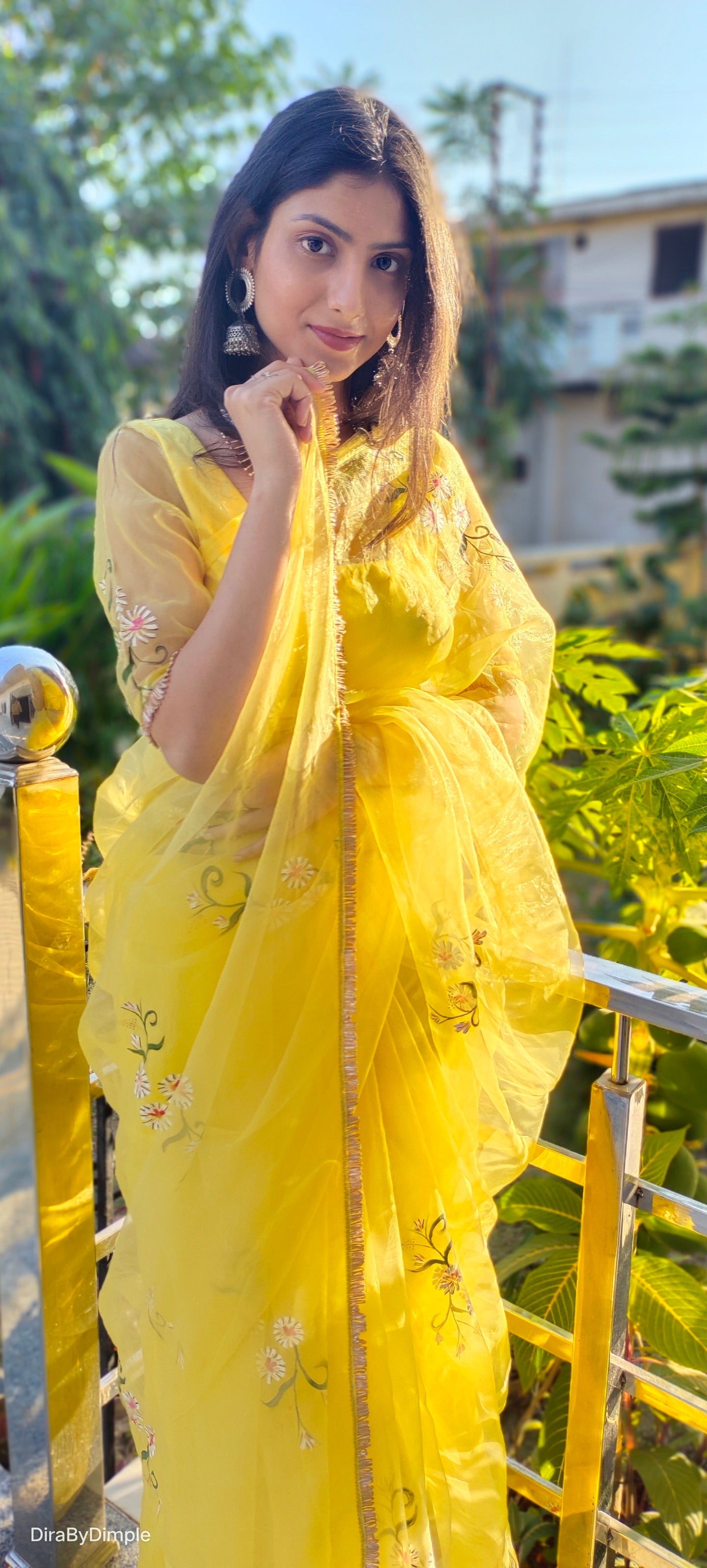 Yellow sunflower saree with floral embroidery, perfect for festive occasions and elegant outings