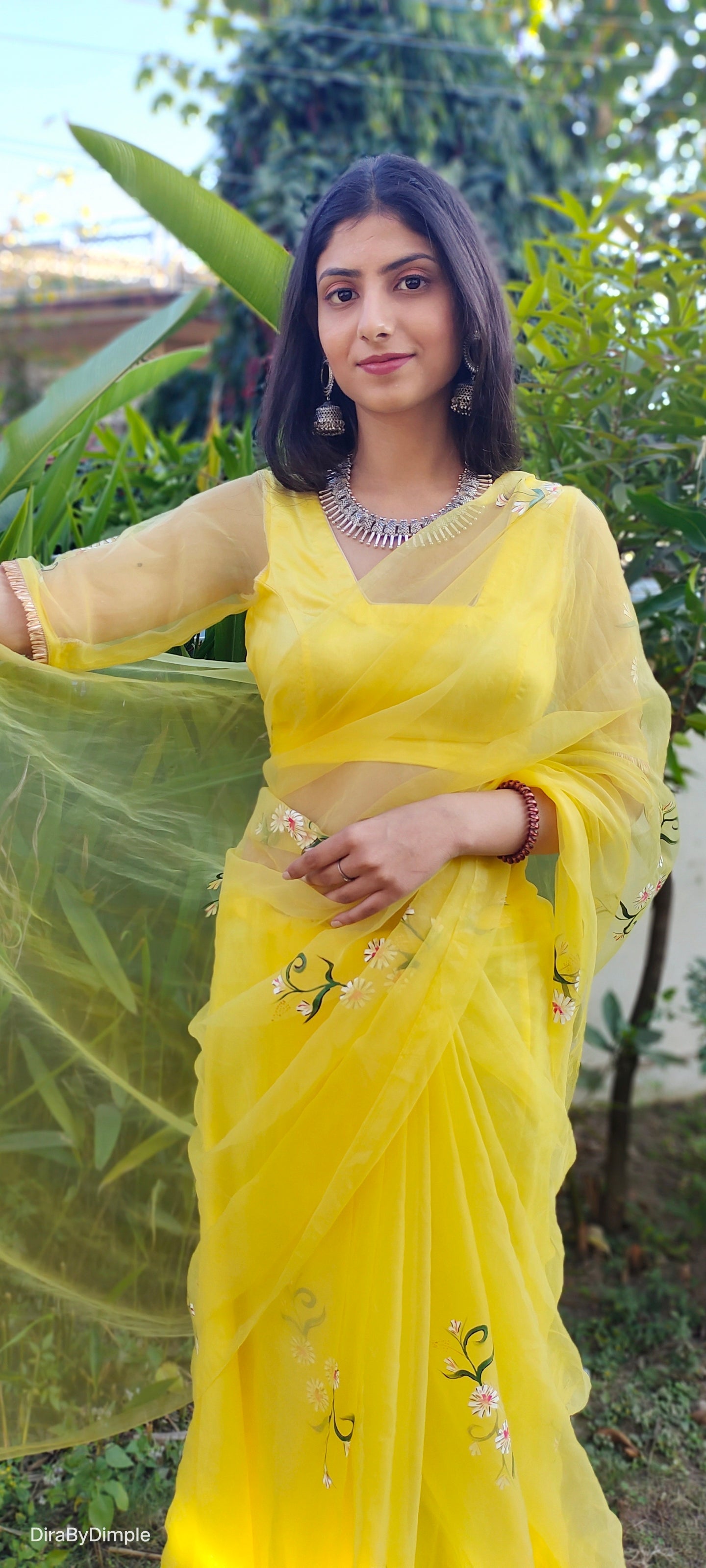 Elegant yellow sunflower saree by DiraByDimple with floral embroidery for festive occasions