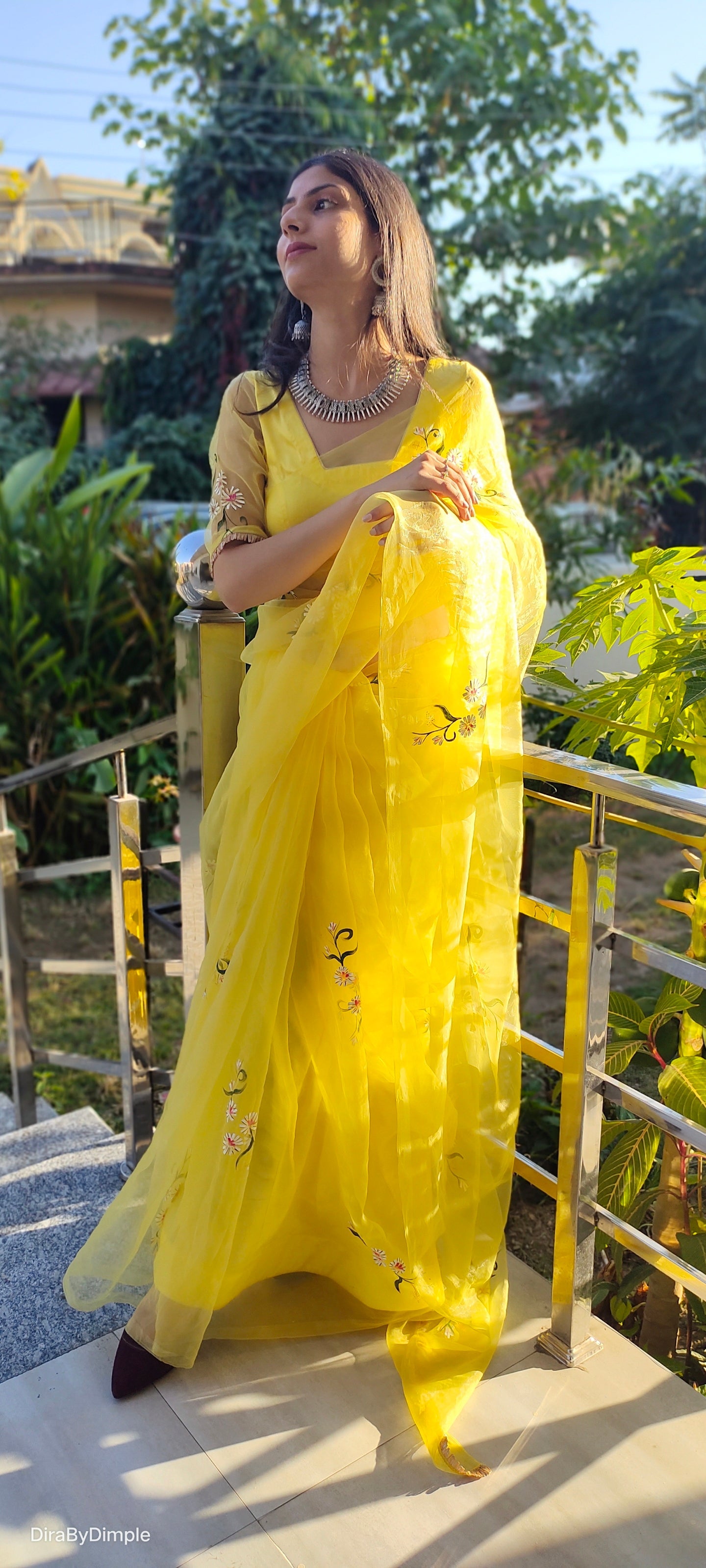 Beautiful yellow sunflower saree with floral embroidery, perfect for festive occasions