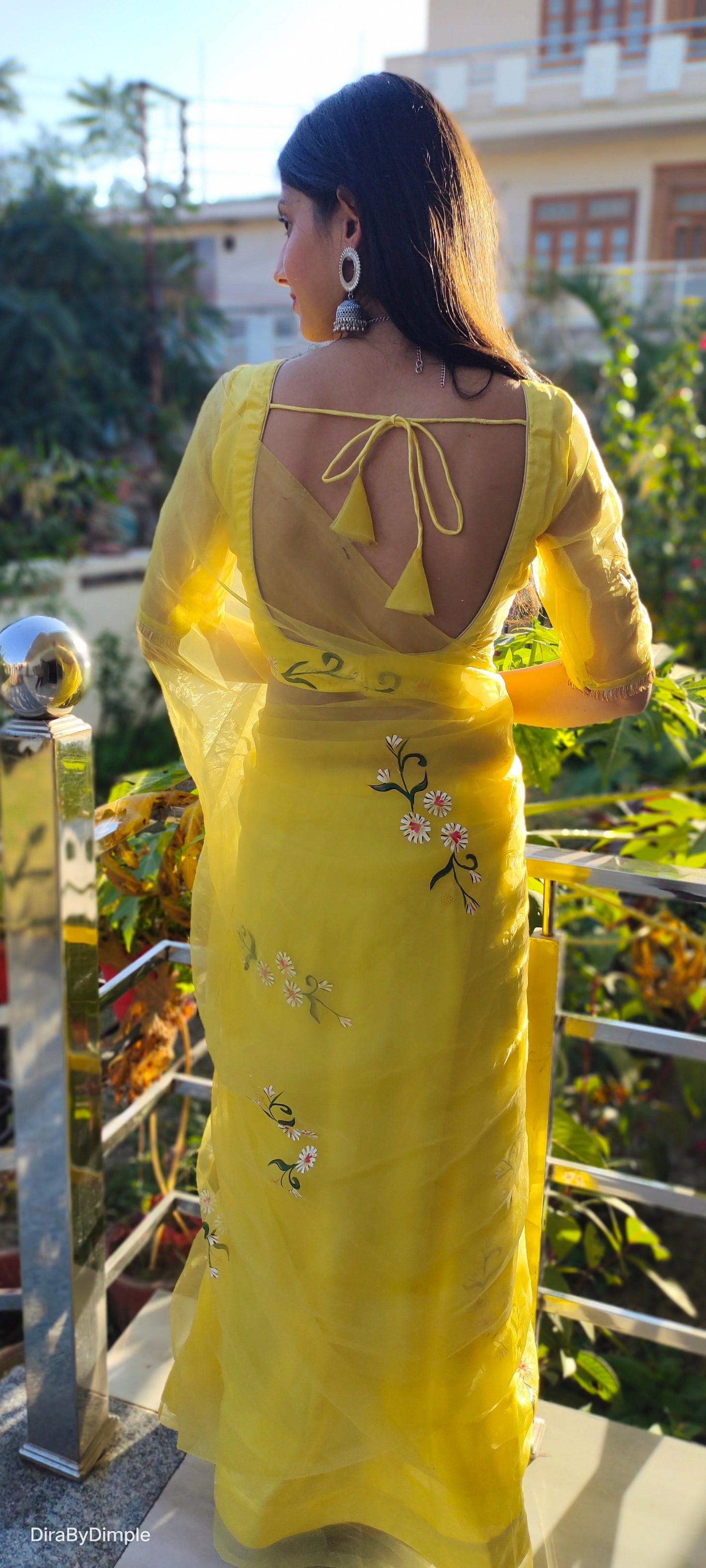 Elegant yellow sunflower saree with floral embroidery, perfect for festive occasions and celebrations