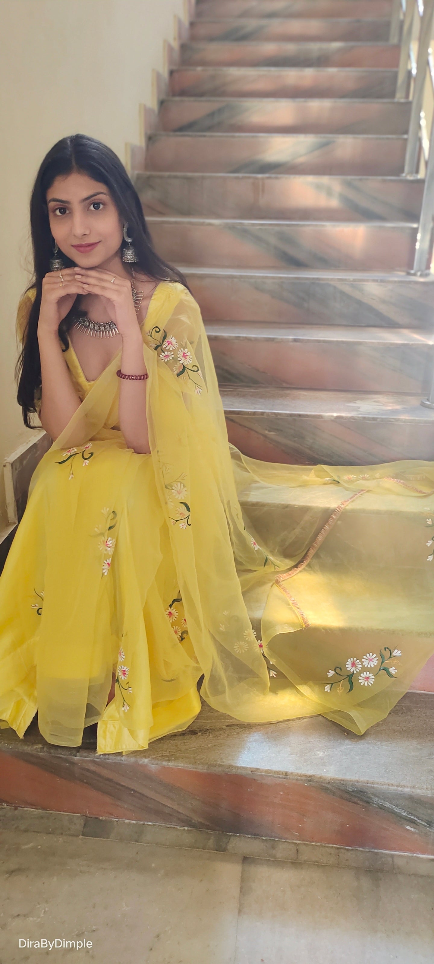 Elegant yellow sunflower saree by DiraByDimple featuring floral embroidery and a lightweight design