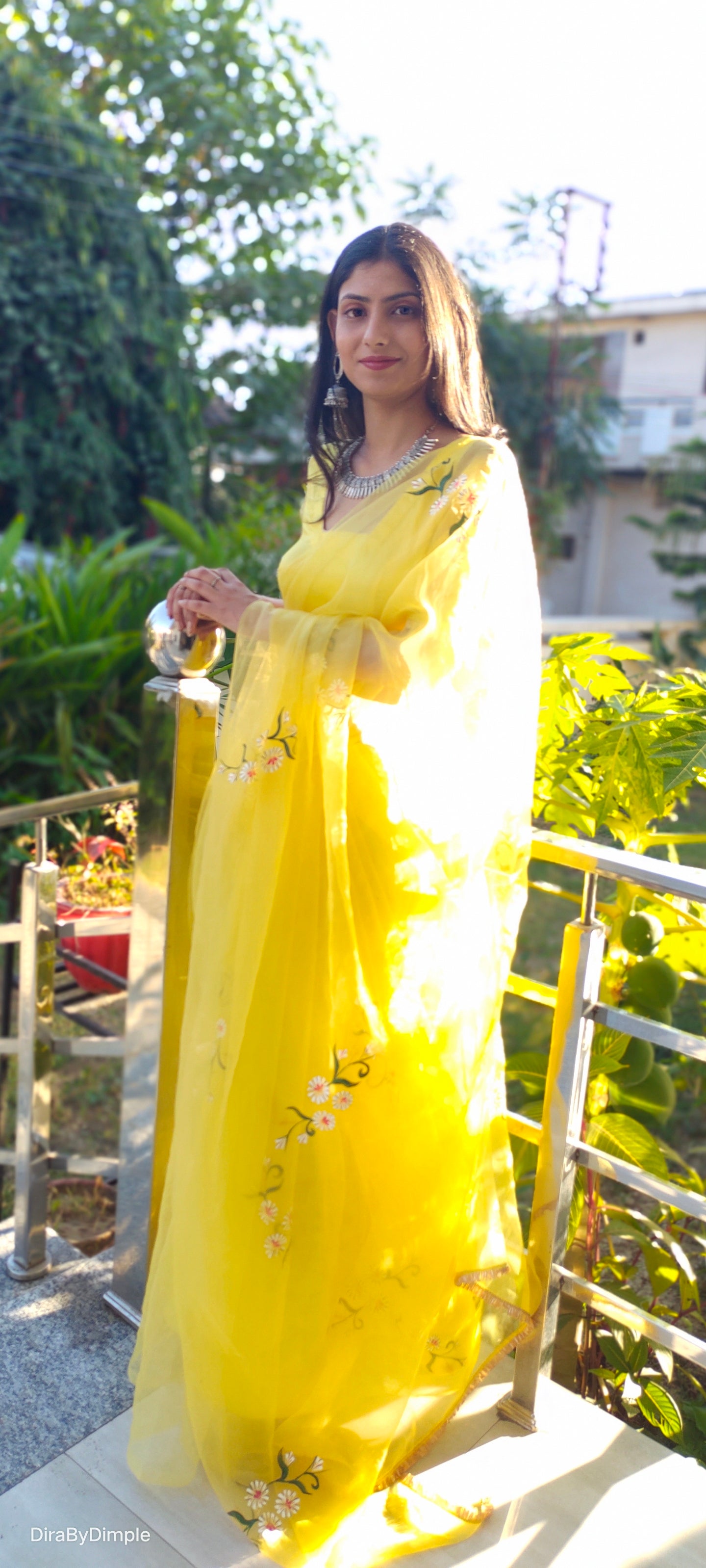DiraByDimple yellow sunflower saree with delicate floral embroidery and elegant draping style