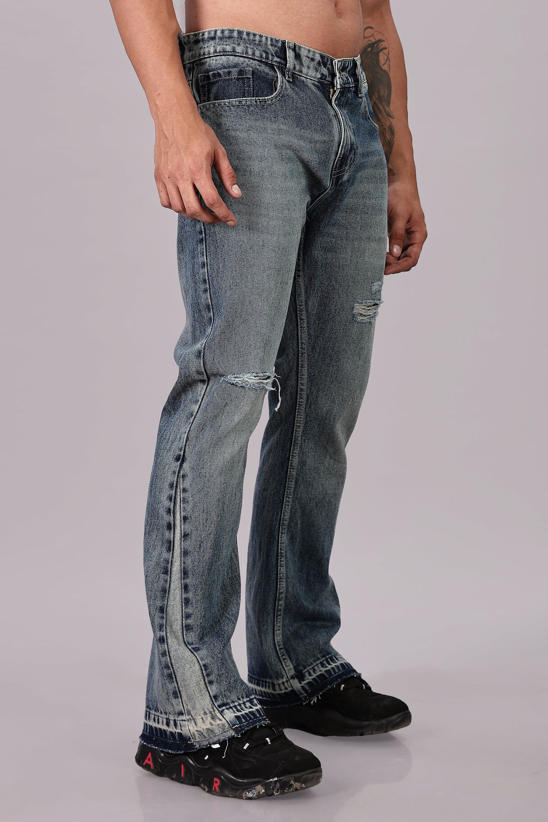 Foul Child Men's Blue Flared Jeans styled with a plain top on Stylera