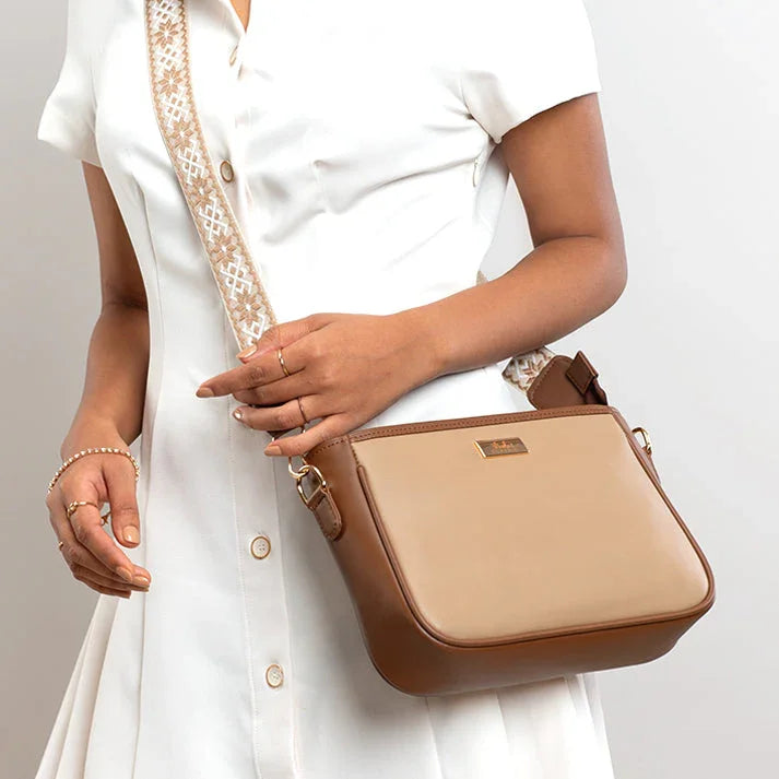 Strokes by Namrata Mehta hand-painted Cinnamon Cocoa sling bag worn cross-body — Stylera India 2026 sling bags guide
