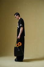 Nevermind Printed Black Oversized T-Shirt Main Character