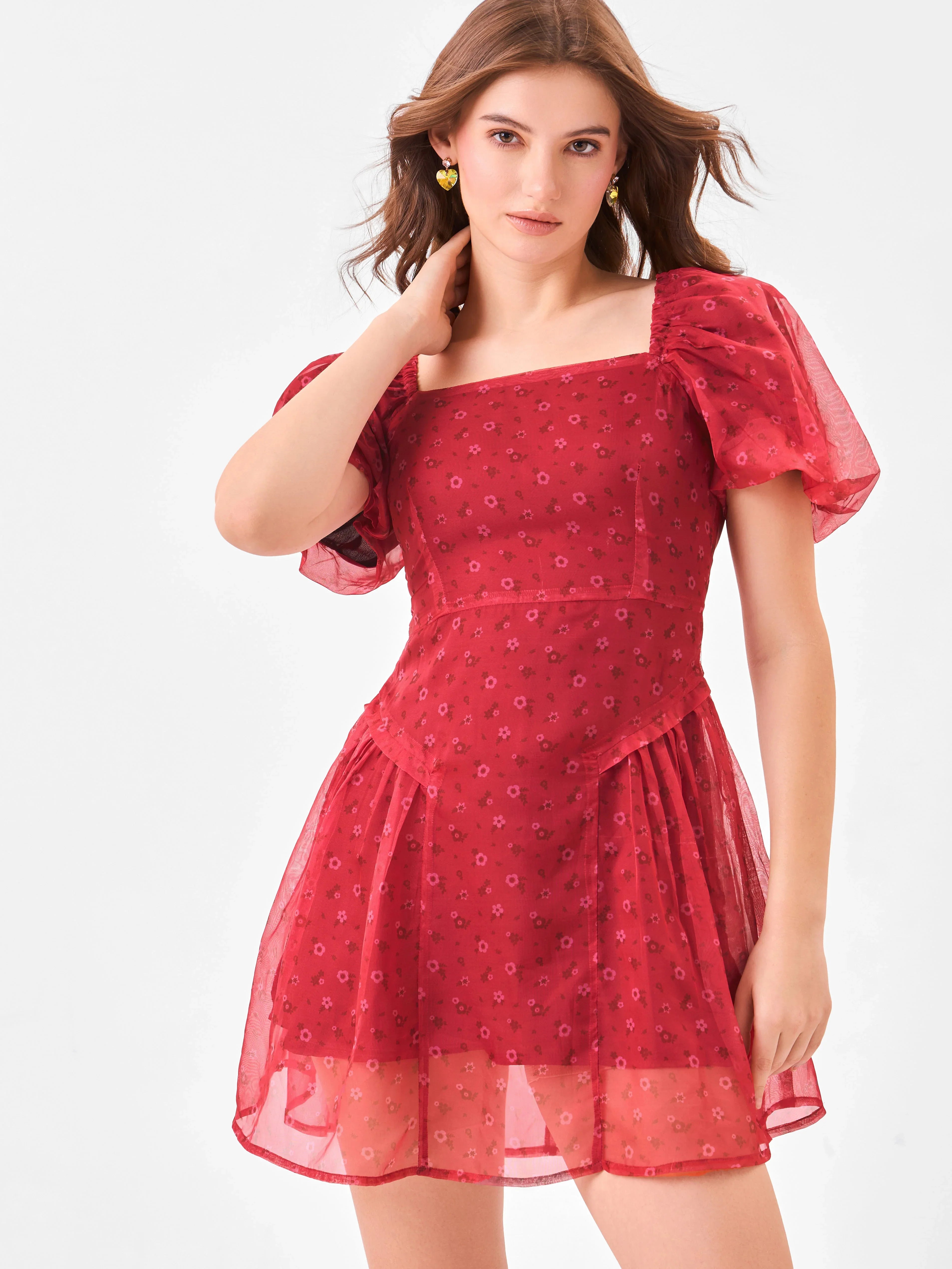 Female model wearing a princess cut square neck red dress from Stylera