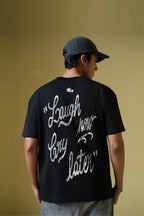 Laugh Now Printed Black Oversized T-Shirt Main Character