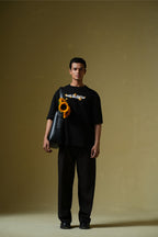 Houdini Printed Black Oversized T-Shirt Main Character