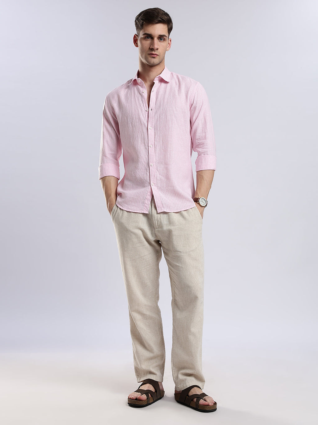 Stylera breathable light pink button-up shirt featuring a subtle vertical weave texture.