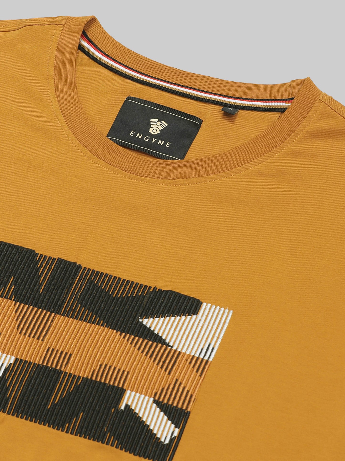 Regular Fit T-shirt in Supima Cotton Lycra with Non-PVC Print and Chest Embroidery Featuring Branded Artwork Play - Mustard