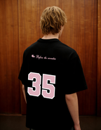 Reimagined Printed Black Oversized T-Shirt Main Character