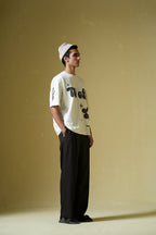 TV Off Printed Cream Oversized T-Shirt Main Character