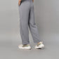 Person wearing the Grey Tie Up Top with Loose Pants Cord Set, featuring loose gray pants with a white side stripe and white sneakers, shown from the back.