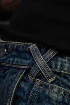 Back view of mid-rise tribal denim jeans men India highlighting the 5-pocket design and wide leg fit.