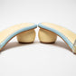 Powder Blue round 2 inch heels with slide straps of intrictae pastel pink, yellow and blue handwork with pearls
