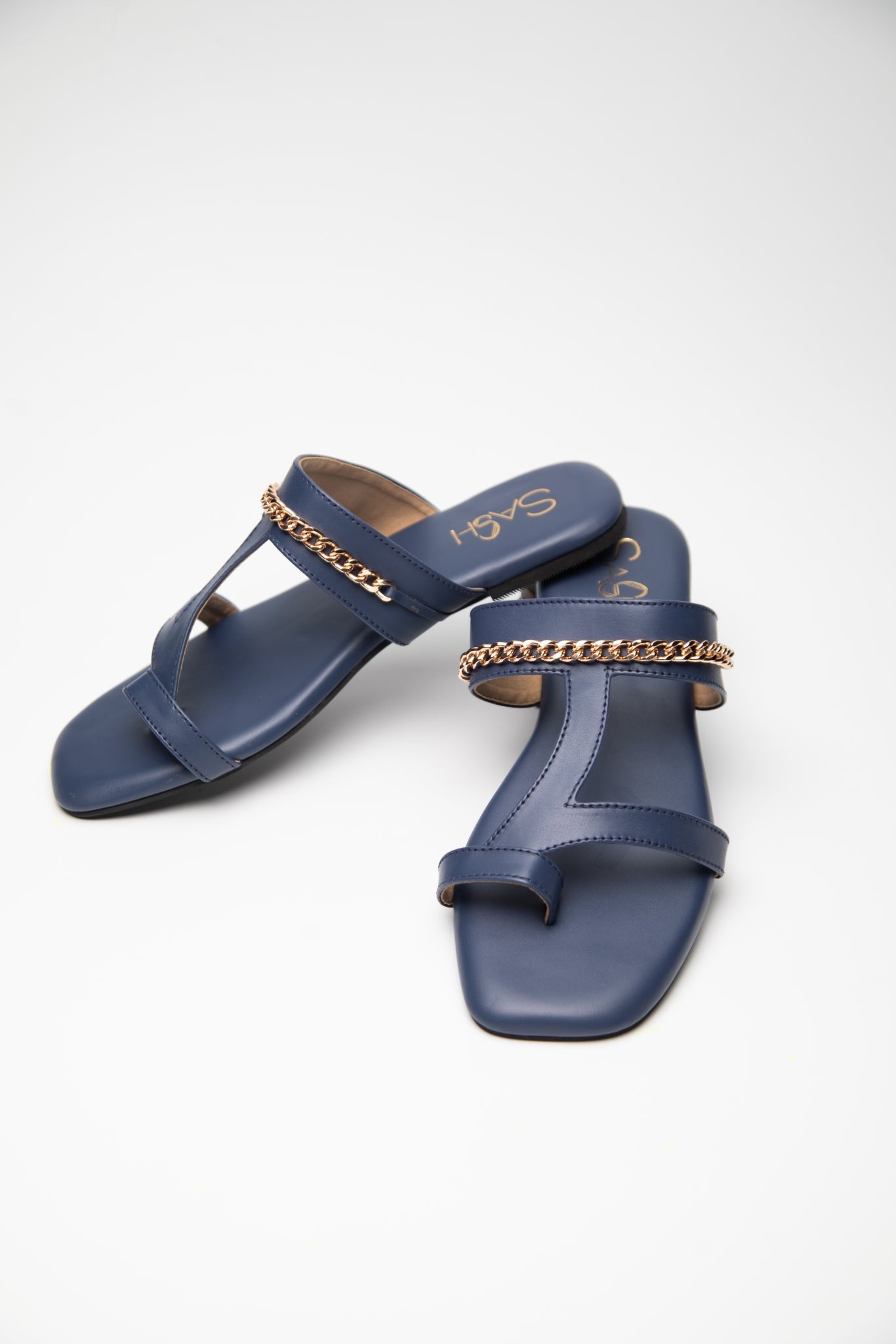 Stylera navy blue flats for women with gold chain detail and square toe design
