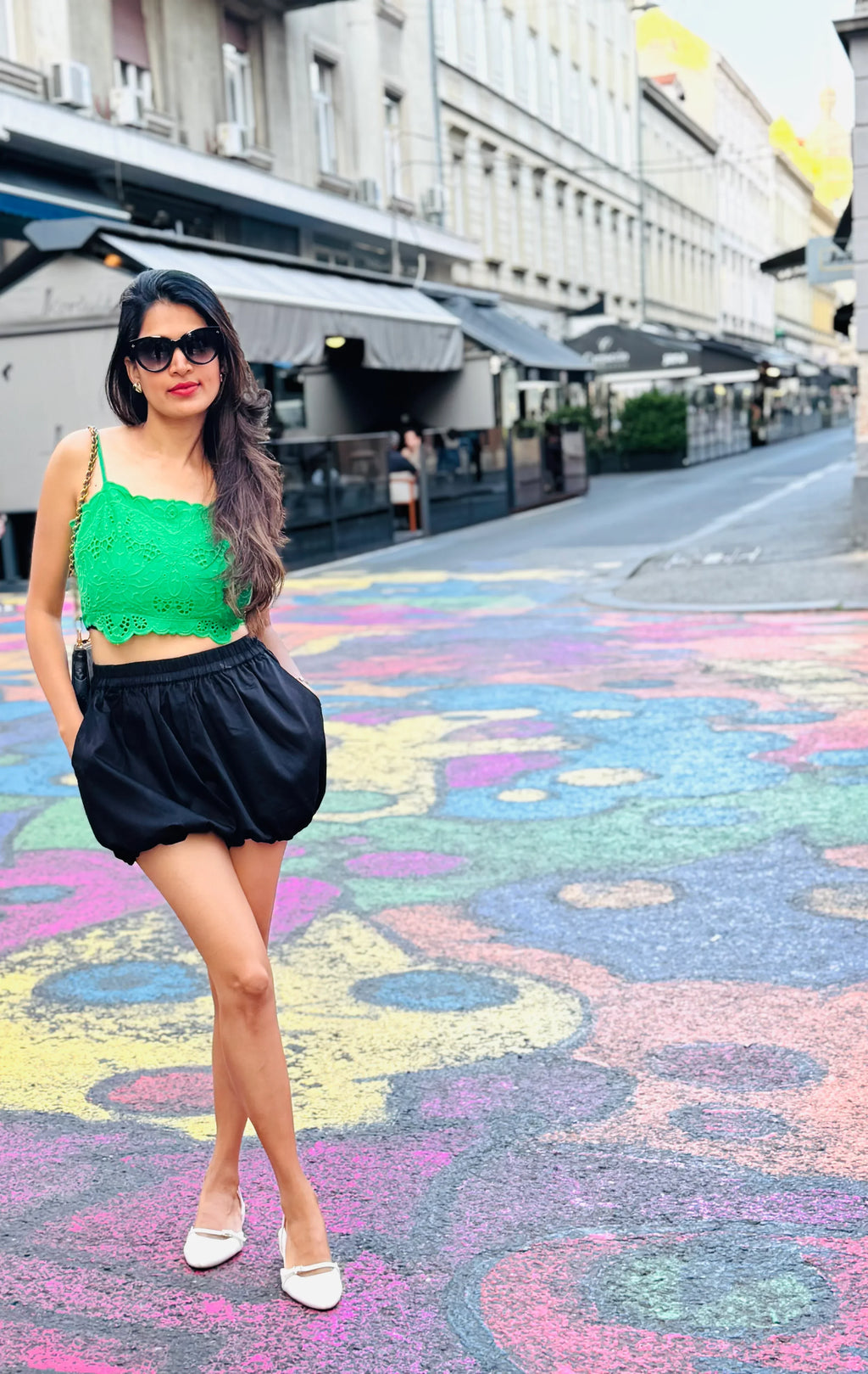 Female model wearing black shorts from Stylera