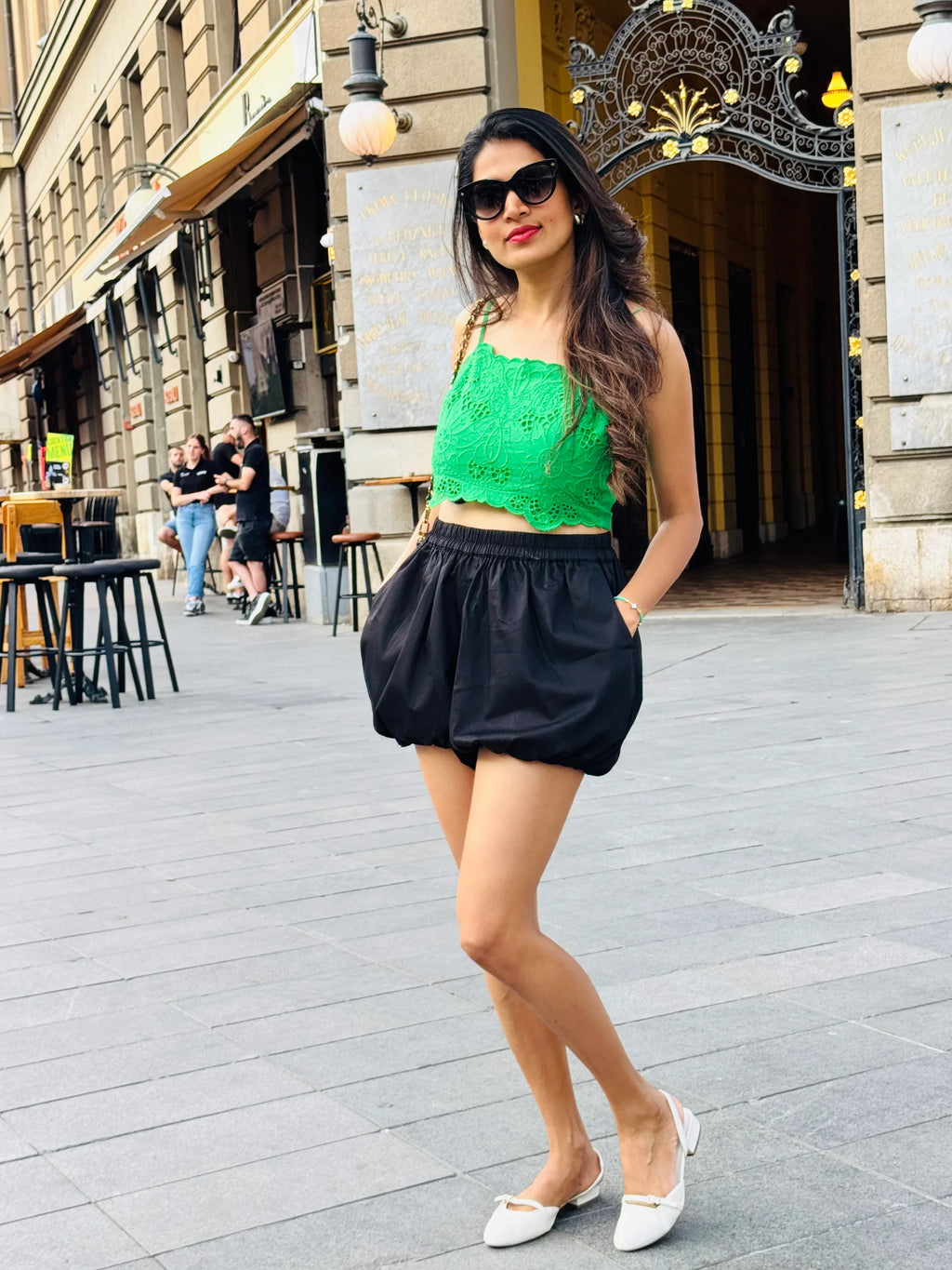 Female model wearing black shorts from Stylera
