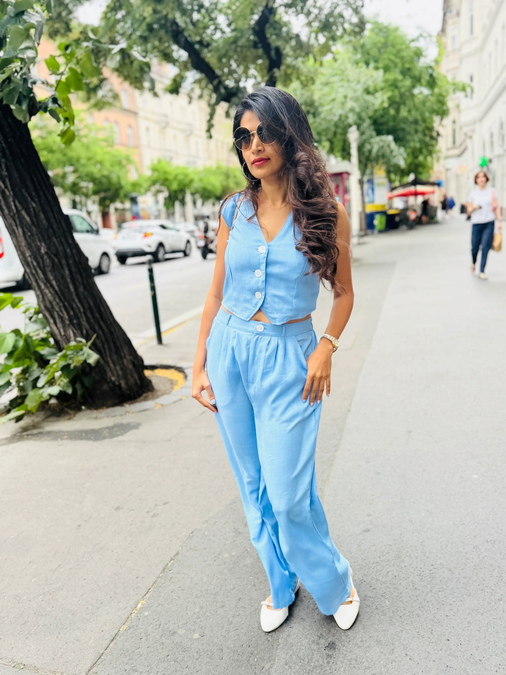 Female model wearing a light blue co-ord set from Stylera