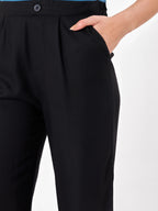 Female model wearing black pant with slip pockets from Stylera