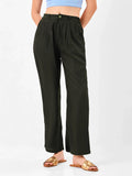 Female model wearing black relaxed fit trouser from Stylera