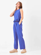 Woman wearing a blue co-ord set includes sleeveless top & relaxed fit pants from Stylera