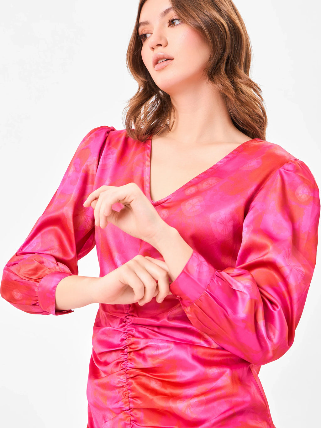 Female model wearing a pink tie-dye sheath dress from Stylera