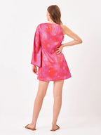 Female model wearing a pink tie-dye dress from Stylera, showcasing backside
