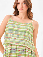 Female model wearing a green square neck striped dress from Stylera