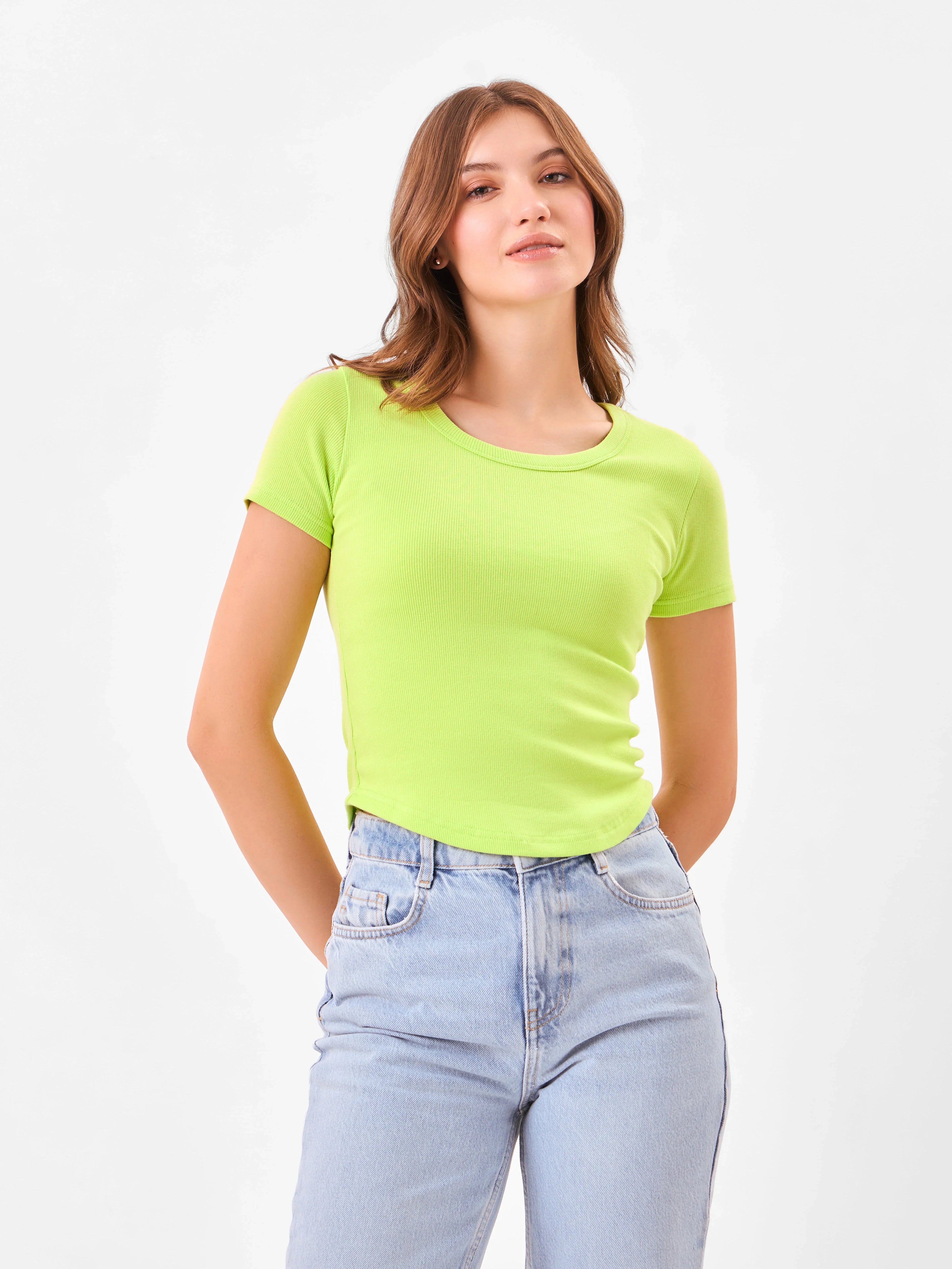 Female model wearing a bright green short sleeves t-shirt from Stylera