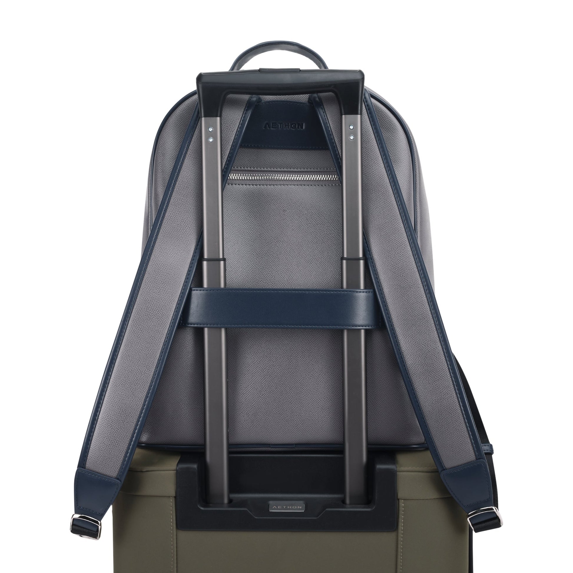 Stylera Apex Backpack for work and travel. Rear view showing padded straps and luggage sleeve on suitcase