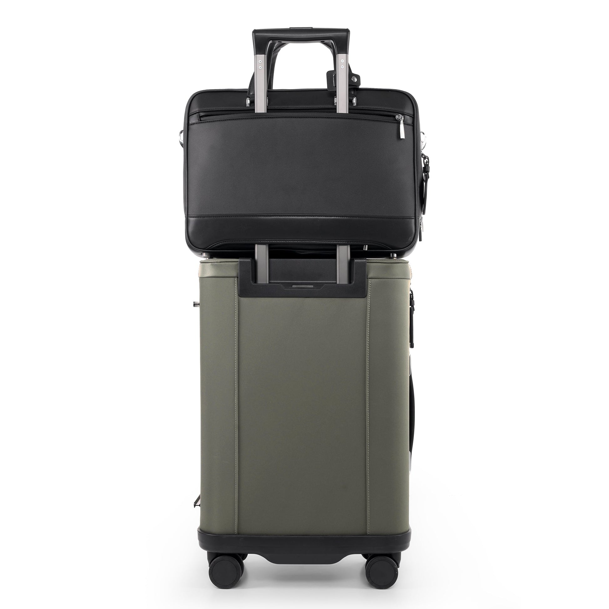 Stylera black leather business briefcase secured on top of olive rolling suitcase for travel and work