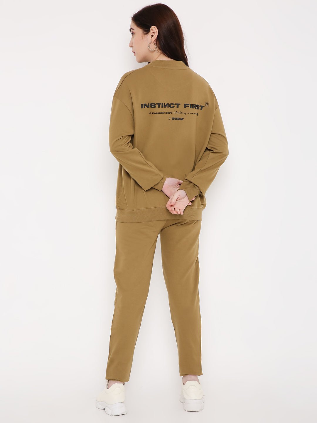 Back view of Stylera brown graphic sweatshirt for men with black logo print paired with matching joggers
