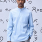Man wearing a light blue regular fit shirt by Stylera with a mandarin collar and long sleeves