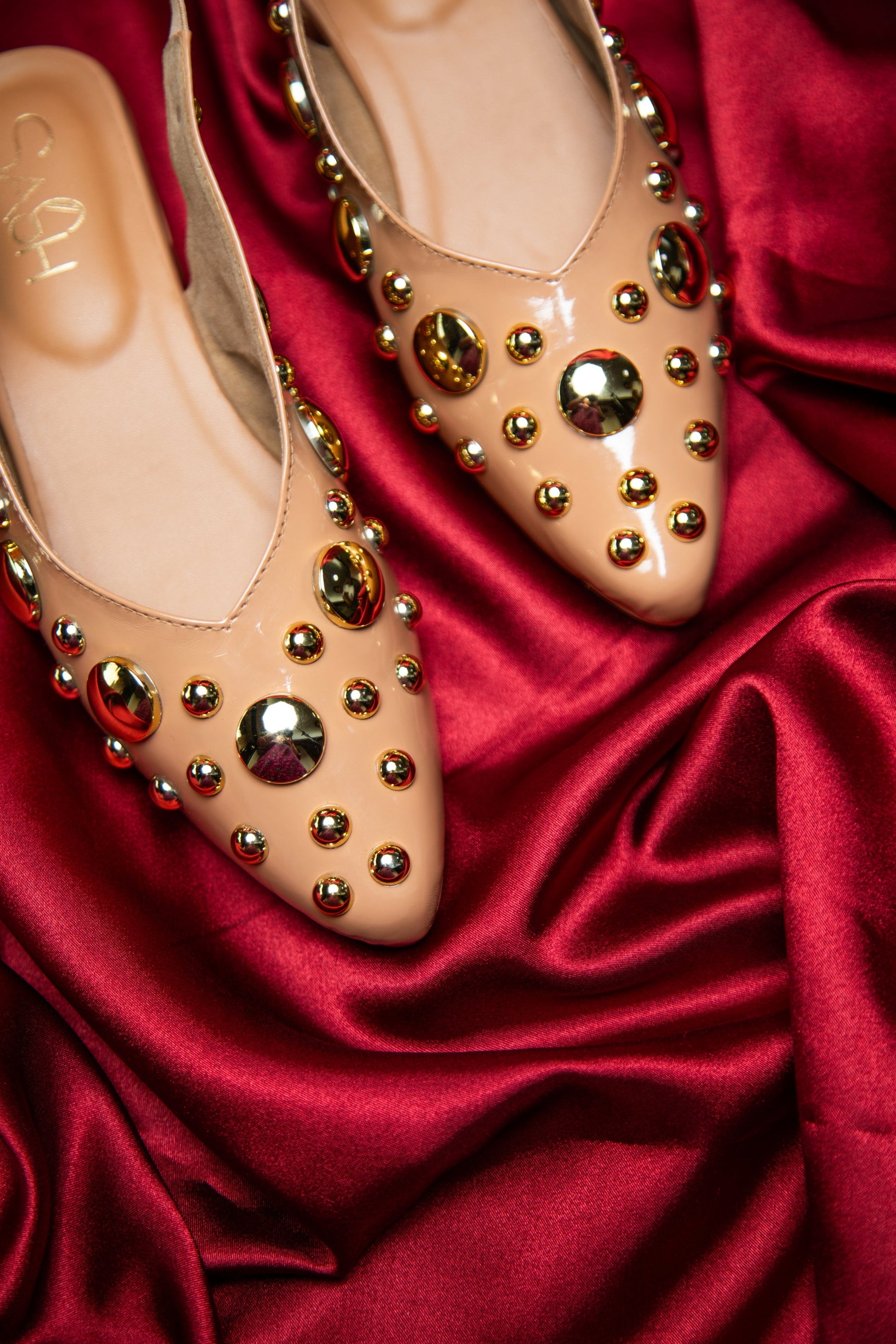 Stylera light gold studded flats heels with round embellishments on satin fabric