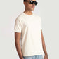 Stylera men's trendy cream t-shirt worn by model with sunglasses and light blue jeans