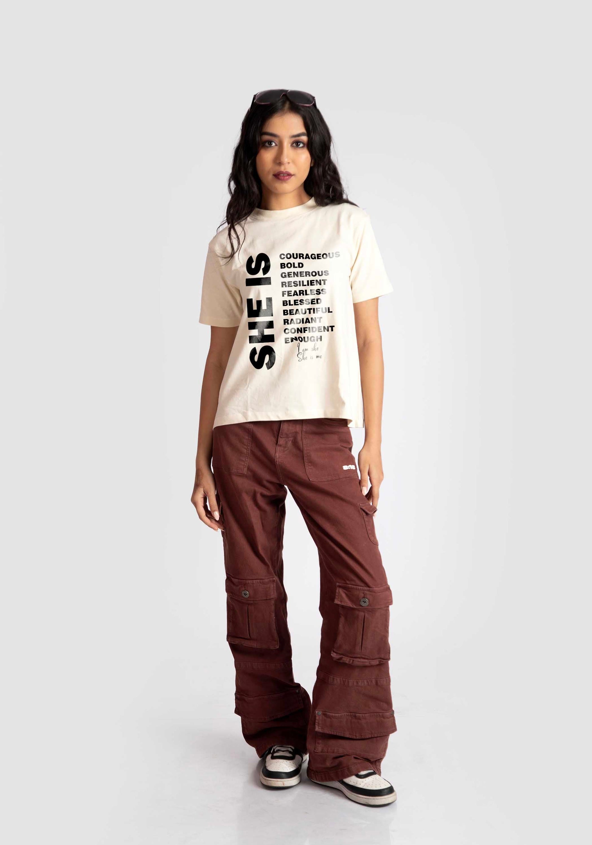 Stylera motivational quote off white t-shirt for women styled with brown cargo pants and sneakers