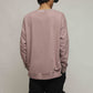 Stylera oversized sweatshirt for men dusty pink crewneck shown from back on model with black pants